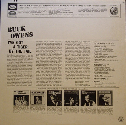 Buck Owens And His Buckaroos - I've Got A Tiger By The Tail