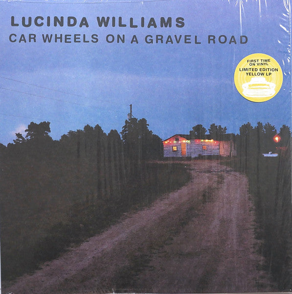 Car Wheels On A Gravel Road - primary