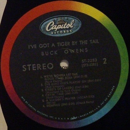 Buck Owens And His Buckaroos - I've Got A Tiger By The Tail
